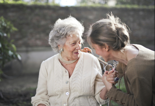 Older woman and daughter, happy after mindfulness activities